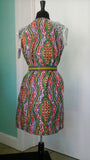 Ankara sheath in Vlisco wax block cotton and lace sleeves