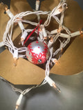 Small Hand Painted White Satin Glass Ornament with Red Henna Art