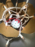 Small Hand Painted White Glass Ornament with Red and Green Henna Art