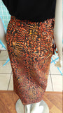 Long Wrap Skirt in Column Silhouette, in Orange and Black Print