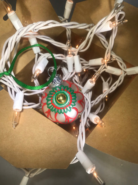 Small Hand Painted White Satin Glass Ornament with Red and Green Henna Art